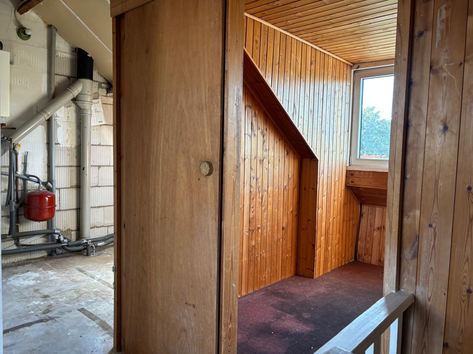 Zolder en bijruimtes worden zorgvuldig leeggehaald tijdens een woningontruiming